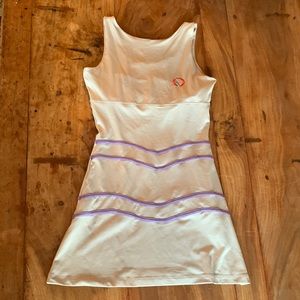Bone tan tennis dress with lavender trim, built in shelf bra and detached shorts